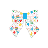Sailor Bow in a dog friendly pattern that shows party images like balloons, cake, gifts, party hats and more. The center is made from solid blue trim. It's complete with attached elastic loops on the back to secure on dog collar.